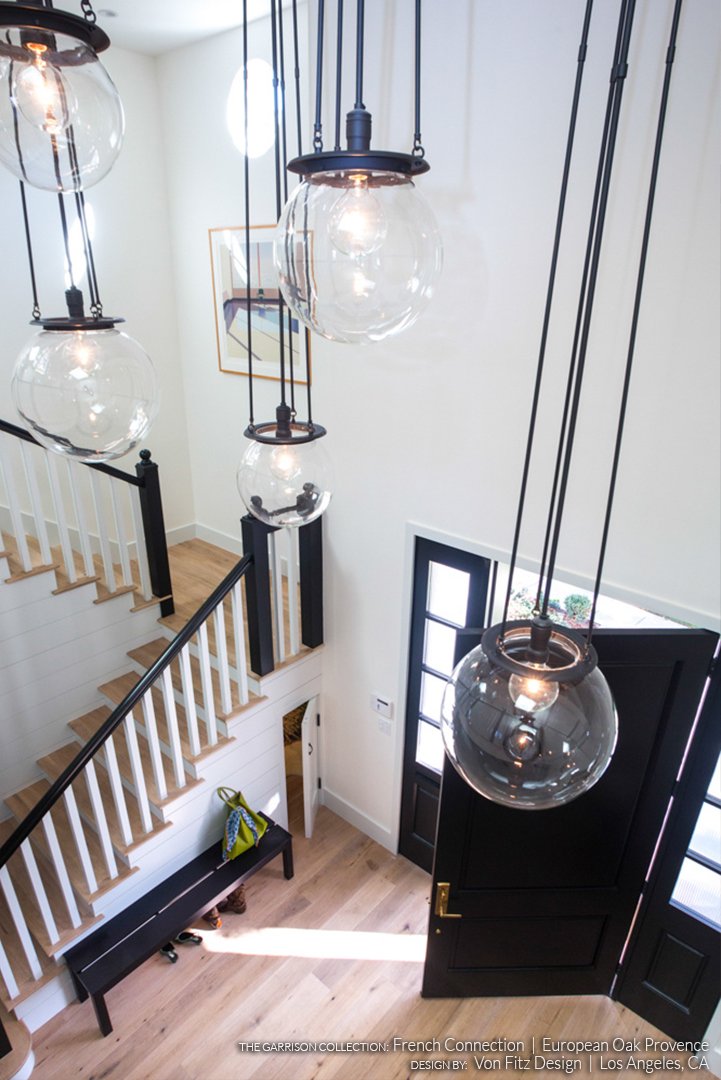 Pendant Lights Above Entryway Featuring French Connection Provence European Oak Flooring - Design By Von Fitz Design in Los Angeles, CA