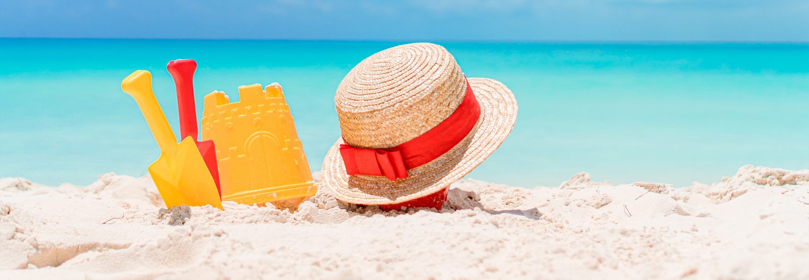 Beach and sandcastle with hat, Summer and Hardwood Flooring