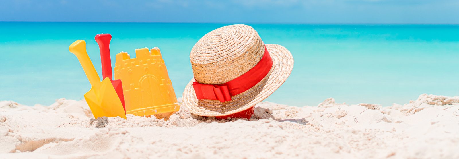 Beach and sandcastle with hat, Summer and Hardwood Flooring